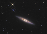 NGC 4013 is an edge-on unbarred spiral galaxy in the constellation Ursa Major